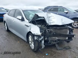 2018 Kia Optima S with VIN 5XXGT4L30JG264726, listed as a IAAI auction lot 42210450 with 131,912 mi miles and . Bid and sale history available at DreamBid. Image 1.