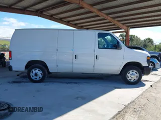 2014 Ford Econoline Cargo Commercial with VIN 1FTNE1EW1EDA66485, listed as a IAAI auction lot 41654271 with 304,974 mi miles and . Bid and sale history available at DreamBid. Image 13.