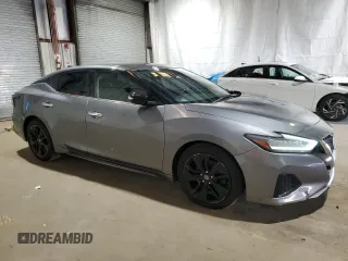 2019 Nissan Maxima SV z VIN 1N4AA6AV2KC360313, wystawiony jako Copart lot #52401595 z przebiegiem 67 822 mil mil oraz Czysty tytuł • Clean title. Historia ofert i sprzedaży dostępna na DreamBid. Obrazek 4.