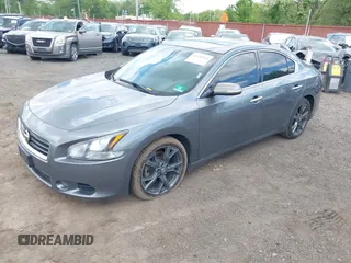 2014 Nissan Maxima S with VIN 1N4AA5AP9EC432415, listed as a IAAI auction lot 42230164 with 149,080 mi miles and . Bid and sale history available at DreamBid. Image 2.
