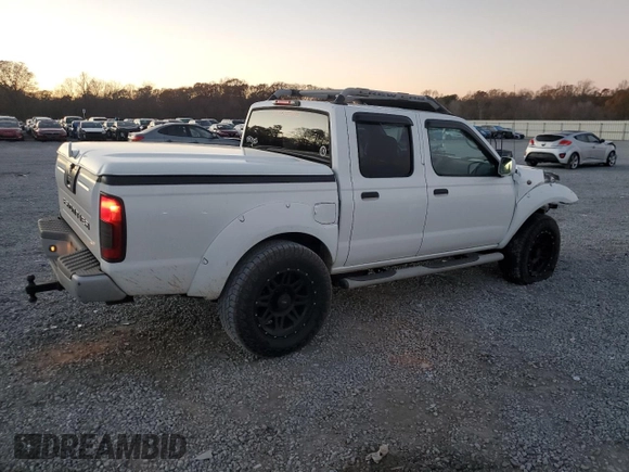 2004 Nissan Frontier LE with VIN 1N6ED27T14C451784, listed as a Copart auction lot 83341854 with 137,982 mi miles and Salvage title. Bid and sale history available at DreamBid. Image 3.