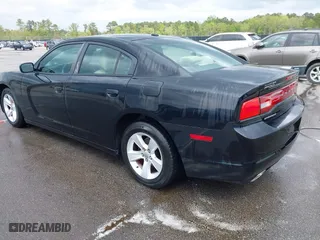 2013 Dodge Charger SE with VIN 2C3CDXBG6DH526840, listed as a IAAI auction lot 41929002 with 273,890 mi miles. Bid and sale history available at carsss.com. Image 3.