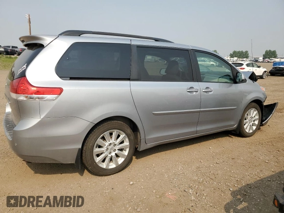 2014 Toyota Sienna Limited with VIN 5TDDK3DC4ES073698, listed as a Copart auction lot 60848915 with 418,121 mi miles and Salvage title. Bid and sale history available at DreamBid. Image 3.