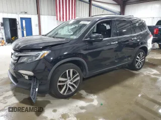 2017 Honda Pilot Touring with VIN 5FNYF6H96HB087634, listed as a Copart auction lot 63535125 with 137,129 mi miles and Salvage title. Bid and sale history available at DreamBid. Image 1.