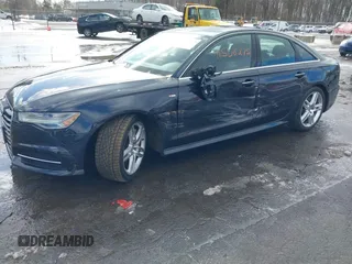 2016 Audi A6 Premium Plus with VIN WAUGFAFC9GN014767, listed as a IAAI auction lot 41508275 with 113,167 mi miles and . Bid and sale history available at DreamBid. Image 2.