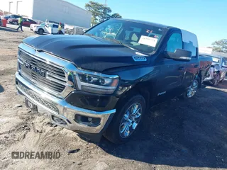 2021 Ram 1500 Big Horn z VIN 1C6RREFG1MN532758, wystawiony jako IAAI lot #41395774 z przebiegiem 66 750 mil mil oraz . Historia ofert i sprzedaży dostępna na DreamBid. Obrazek 2.