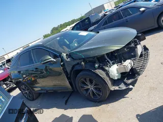 2021 Lexus RX 350 with VIN 2T2HZMAA2MC199129, listed as a IAAI auction lot 41990653 with 60,574 mi miles and . Bid and sale history available at DreamBid. Image 14.