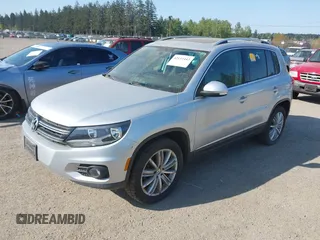 2012 Volkswagen Tiguan S with VIN WVGBV7AX5CW602405, listed as a IAAI auction lot 42111443 with 109,654 mi miles and . Bid and sale history available at DreamBid. Image 2.