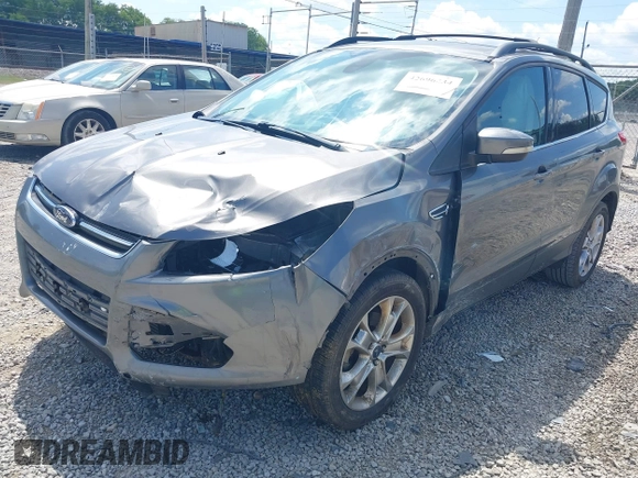 2013 Ford Escape SEL with VIN 1FMCU0HXXDUD51754, listed as a IAAI auction lot 42696434 with 145,705 mi miles and . Bid and sale history available at DreamBid. Image 2.