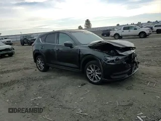 2019 Mazda CX-5 Grand Touring with VIN JM3KFBDM9K1650840, listed as a Copart auction lot 41929185 with 61,814 mi miles and Salvage Title. Bid and sale history available at carsss.com. Image 11.