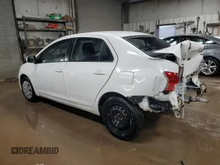 2010 Toyota Yaris with VIN JTDBT4K37A4079417, listed as a Copart auction lot 52045485 with 149,747 mi miles and Salvage Title. Bid and sale history available at carsss.com. Image 2.