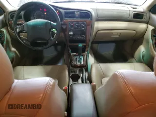 2002 Subaru Legacy Outback Limited with VIN 4S3BH686527655570, listed as a Copart auction lot 84155434 with 210,207 mi miles and Salvage title. Bid and sale history available at DreamBid. Image 8.