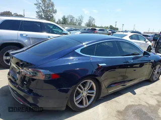 2013 Tesla Model S with VIN 5YJSA1DN1DFP05317, listed as a IAAI auction lot 42086998 with 150,964 mi miles. Bid and sale history available at carsss.com. Image 4.