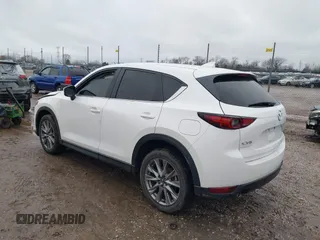 2021 Mazda CX-5 Grand Touring with VIN JM3KFADM4M1340141, listed as a IAAI auction lot 41194711 with 37,887 mi miles. Bid and sale history available at carsss.com. Image 3.
