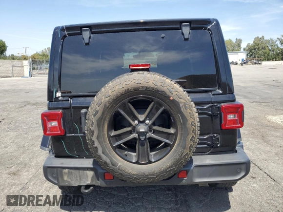 2021 Jeep Wrangler Unlimited Sahara с VIN 1C4HJXEG5MW731203, выставлен на аукционе Copart как лот 58005355 с пробегом 57 559 миль миль и Списание • Salvage title. История ставок и продаж доступна на DreamBid. Изображение 6.