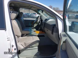 2004 Infiniti QX56 with VIN 5N3AA08CX4N809761, listed as a IAAI auction lot 42041581 with 136,941 mi miles. Bid and sale history available at carsss.com. Image 5.