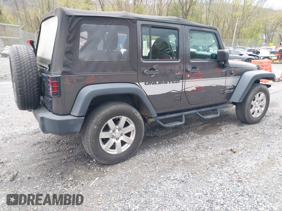 2018 Jeep Wrangler JK Unlimited Sport S with VIN 1C4BJWDG8JL895981, listed as a IAAI auction lot 42048316 with 95,457 mi miles. Bid and sale history available at carsss.com. Image 4.