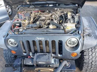 2007 Jeep Wrangler Rubicon with VIN 1J8GA64197L116283, listed as a IAAI auction lot 41008968 with 215,388 mi miles and . Bid and sale history available at DreamBid. Image 10.