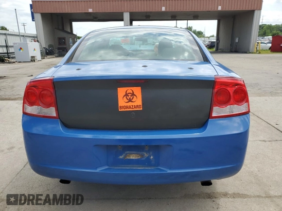 2010 Dodge Charger Police with VIN 2B3CA4CT0AH256323, listed as a Copart auction lot 63498564 with 196,902 mi miles and Salvage Title. Bid and sale history available at DreamBid. Image 6.