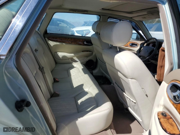 2000 Jaguar XJ with VIN SAJDA14C1YLF10459, listed as a Copart auction lot 65583394 with 113,333 mi miles and Salvage Title. Bid and sale history available at carsss.com. Image 10.
