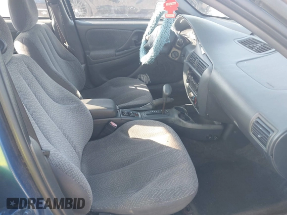 2004 Chevrolet Cavalier LS z VIN 1G1JF52F147169581, wystawiony jako IAAI lot #42384321 z przebiegiem 136 416 mil mil oraz . Historia ofert i sprzedaży dostępna na DreamBid. Obrazek 5.