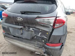 2017 Hyundai Tucson Value with VIN KM8J33A22HU358357, listed as a IAAI auction lot 41583774 with 139,338 mi miles. Bid and sale history available at carsss.com. Image 6.