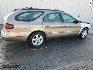 2002 Ford Taurus SE with VIN 1FAFP58S02G278065, listed as a Copart auction lot 53030885 with 131,984 mi miles and Salvage Title. Bid and sale history available at carsss.com. Image 3.