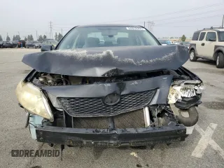 2010 Toyota Corolla with VIN JTDBU4EE3A9123331, listed as a Copart auction lot 60869295 with 185,744 mi miles and Salvage title. Bid and sale history available at DreamBid. Image 5.