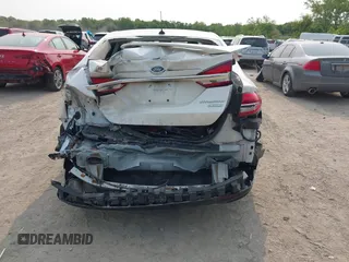 2017 Ford Fusion Titanium z VIN 3FA6P0K92HR396113, wystawiony jako IAAI lot #42402969 z przebiegiem 185 620 mil mil oraz . Historia ofert i sprzedaży dostępna na DreamBid. Obrazek 16.