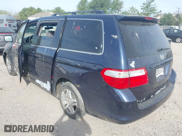 2005 Honda Odyssey EX with VIN 5FNRL38455B135555, listed as a IAAI auction lot 42080079 with 149,468 mi miles and . Bid and sale history available at carsss.com. Image 3.
