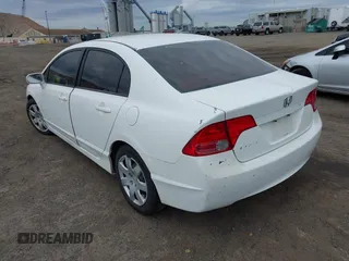 2006 Honda Civic LX with VIN 1HGFA16556L084177, listed as a IAAI auction lot 42053325 with 142,664 mi miles and . Bid and sale history available at DreamBid. Image 3.