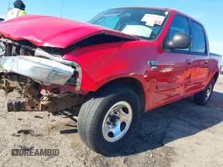 2003 Ford F-150 XLT with VIN 1FTRW07L03KC47484, listed as a IAAI auction lot 41653389 with 283,296 mi miles. Bid and sale history available at carsss.com. Image 2.