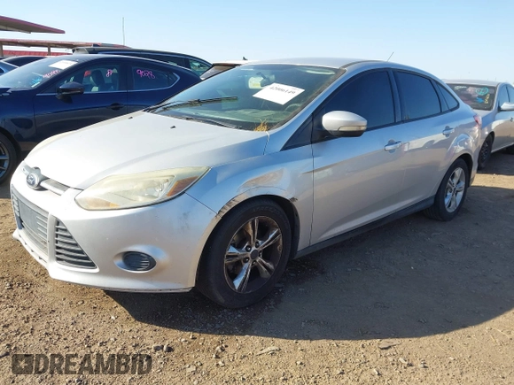 2013 Ford Focus SE with VIN 1FADP3F29DL153736, listed as a IAAI auction lot 42006149 with 176,935 mi miles. Bid and sale history available at carsss.com. Image 2.