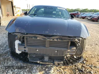 2024 Ford Mustang EcoBoost with VIN 1FA6P8TH1R5132860, listed as a Copart auction lot 52870255 with 10,942 mi miles and Salvage Title. Bid and sale history available at DreamBid. Image 5.