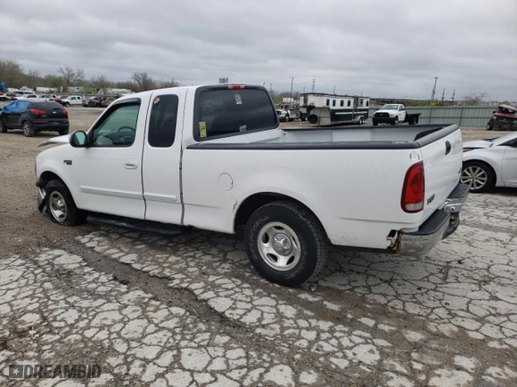 1999 Ford F-150 Work Series with VIN 1FTZX1727XKB60214, listed as a Copart auction lot 80612004 with 255,303 mi miles and Salvage Title. Bid and sale history available at carsss.com. Image 2.