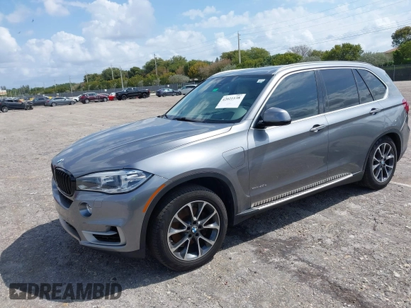 2016 BMW X5 xDrive40e with VIN 5UXKT0C58G0S75938, listed as a IAAI auction lot 42021138 with 97,426 mi miles and . Bid and sale history available at DreamBid. Image 2.