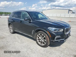 2021 BMW X5 xDrive45e with VIN 5UXTA6C02M9F50974, listed as a Copart auction lot 56358745 with 46,945 mi miles and Salvage title. Bid and sale history available at DreamBid. Image 4.