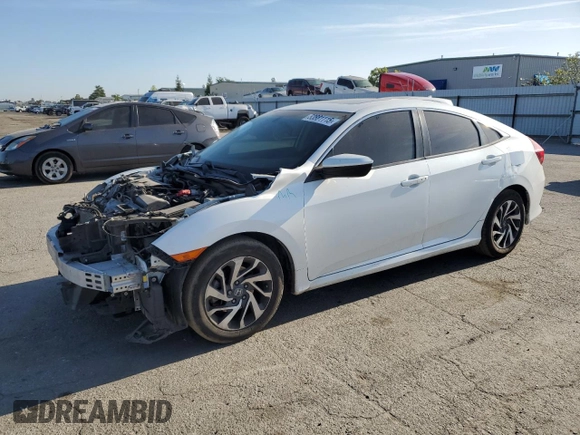 2017 Honda Civic EX z VIN 19XFC2F75HE201784, wystawiony jako Copart lot #53881115 z przebiegiem 135 348 mil mil oraz Szkoda całkowita • Salvage title. Historia ofert i sprzedaży dostępna na DreamBid. Obrazek 1.