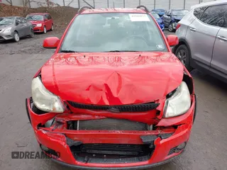 2011 Suzuki SX4 Crossover with VIN JS2YB5A39B6301570, listed as a IAAI auction lot 41666875 with 103,724 mi miles. Bid and sale history available at carsss.com. Image 12.