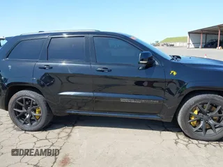 2020 Jeep Grand Cherokee Trackhawk with VIN 1C4RJFN96LC336561, listed as a IAAI auction lot 41991800 with 58,781 mi miles and . Bid and sale history available at DreamBid. Image 13.