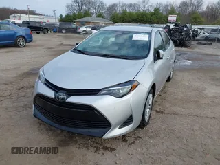 2019 Toyota Corolla L with VIN 5YFBURHE2KP934042, listed as a IAAI auction lot 41963491 with 87,299 mi miles. Bid and sale history available at carsss.com. Image 18.
