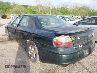 2002 Pontiac Bonneville SLE z VIN 1G2HY54K324126583, wystawiony jako IAAI lot #41939075 z przebiegiem 178 591 mil mil oraz . Historia ofert i sprzedaży dostępna na DreamBid. Obrazek 3.
