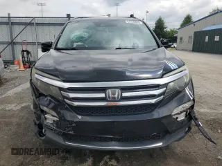 2017 Honda Pilot Touring with VIN 5FNYF6H90HB024321, listed as a Copart auction lot 57459895 with 134,244 mi miles and Salvage title. Bid and sale history available at DreamBid. Image 5.