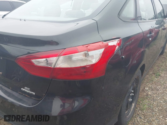 2012 Ford Focus SE with VIN 1FAHP3F28CL451694, listed as a IAAI auction lot 42491774 with Not provided miles and . Bid and sale history available at DreamBid. Image 16.