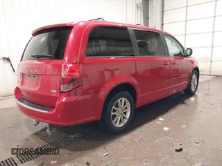 2013 Dodge Grand Caravan SXT with VIN 2C4RDGCG9DR669053, listed as a IAAI auction lot 41626033 with 170,007 mi miles and . Bid and sale history available at DreamBid. Image 4.