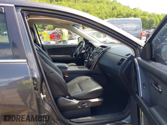 2014 Mazda CX-9 Touring with VIN JM3TB3CV9E0426767, listed as a IAAI auction lot 42301021 with 129,497 mi miles and . Bid and sale history available at DreamBid. Image 5.