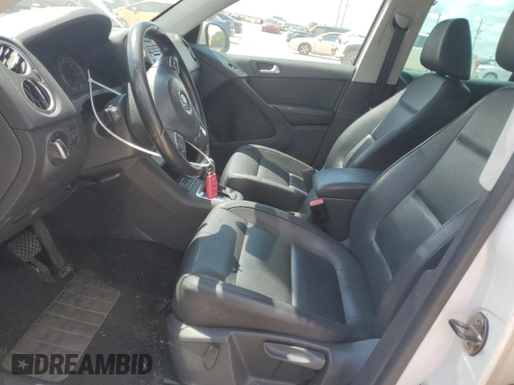 2011 Volkswagen Tiguan SEL w/Premium Navi z VIN WVGAV7AX1BW540155, wystawiony jako Copart lot #56483975 z przebiegiem 137 970 mil mil oraz Czysty tytuł • Clean title. Historia ofert i sprzedaży dostępna na DreamBid. Obrazek 7.
