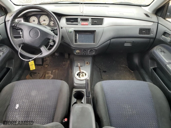 2003 Mitsubishi Lancer OZ-Rally with VIN JA3AJ86E33U079131, listed as a Copart auction lot 88582825 with 213,593 mi miles and Salvage Title. Bid and sale history available at carsss.com. Image 8.