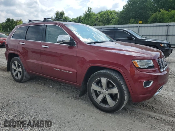 2015 Jeep Grand Cherokee Overland with VIN 1C4RJECG2FC823353, listed as a Copart auction lot 58367395 with 72,117 mi miles and Salvage title. Bid and sale history available at DreamBid. Image 4.