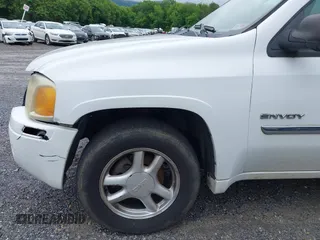 2006 GMC Envoy SLE z VIN 1GKDT13S562116159, wystawiony jako IAAI lot #42361666 z przebiegiem 243 466 mil mil oraz . Historia ofert i sprzedaży dostępna na DreamBid. Obrazek 14.